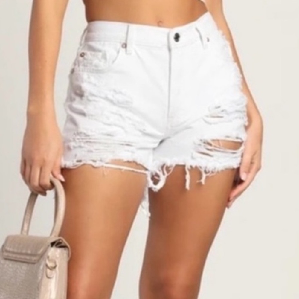 Free people White Distressed Denim Shorts size 29